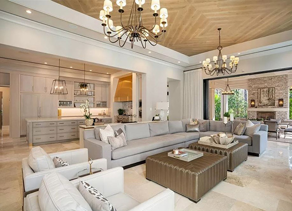Family Room Open to Kitchen with Recessed and Chandelier Lighting