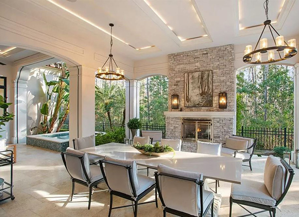 Family Room Open to Kitchen with Recessed and Chandelier Lighting